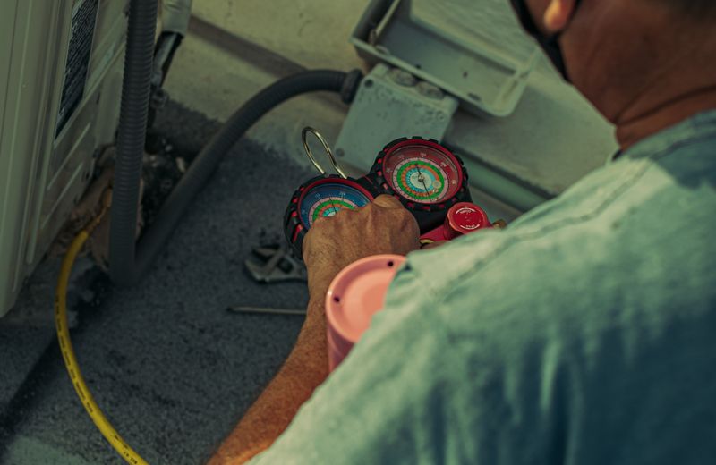 Licensed electrician testing a circuit with a multimeter in New Smyrna Beach